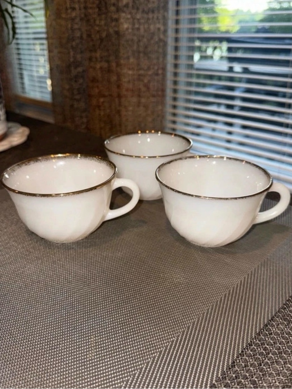Vintage Fire-King Swirl milk glass teacups with gold trim Set of 3.
